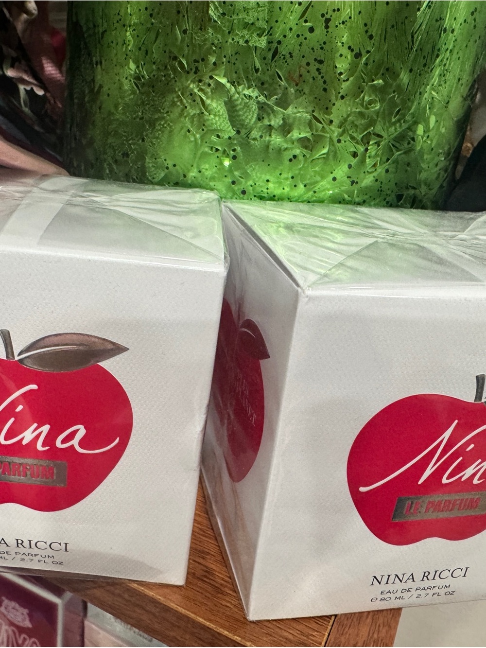 Two Nina Ricci White Box with Red Apple Logo